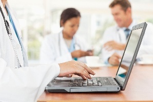 Doctor using a laptop